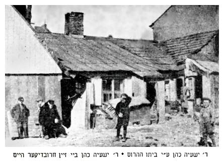  Reb Yishaiyeh Cohen beside his destroyed home