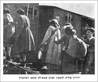 Jews board the death train carrying them to Auschwitz