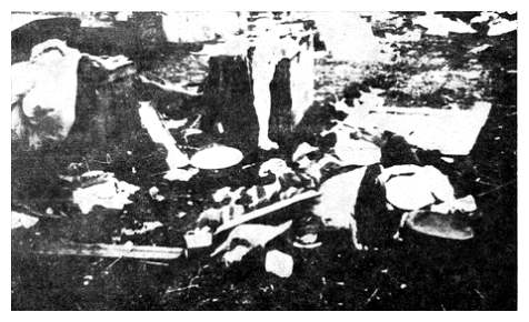 san534b-2.jpg [28 KB] - Ownerless utensils and belongings that remained in the yard of the Zaslaw camp after the transport left for the extermination camp