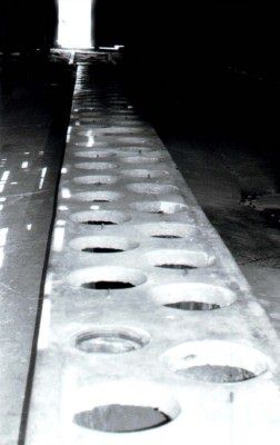 Row of latrines in inside barracks