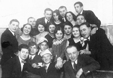 A group of Kibart youth with their guests at a party