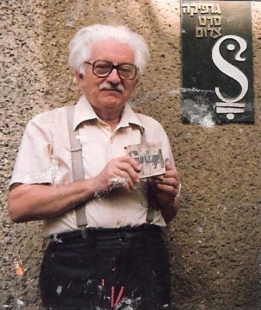 Joseph Bau with his book of poems